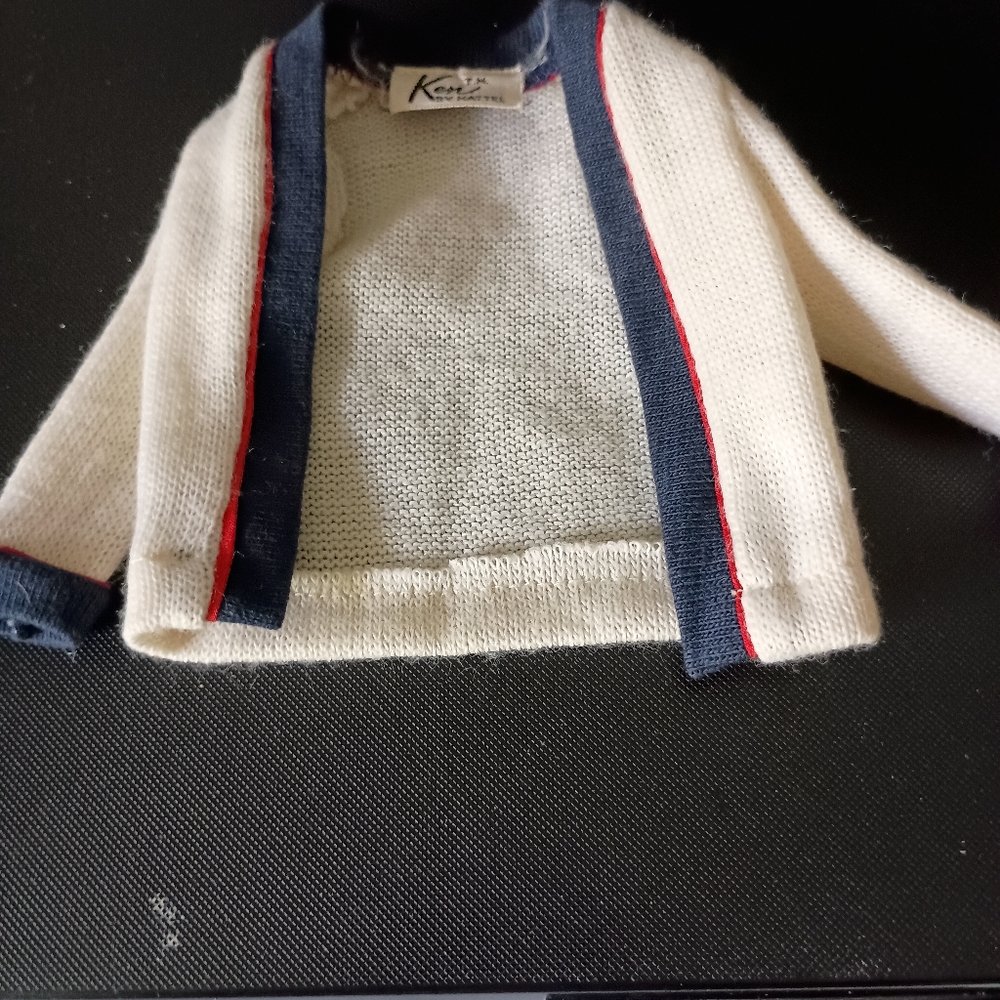 Vintage Ken doll white, red and blue sweater.